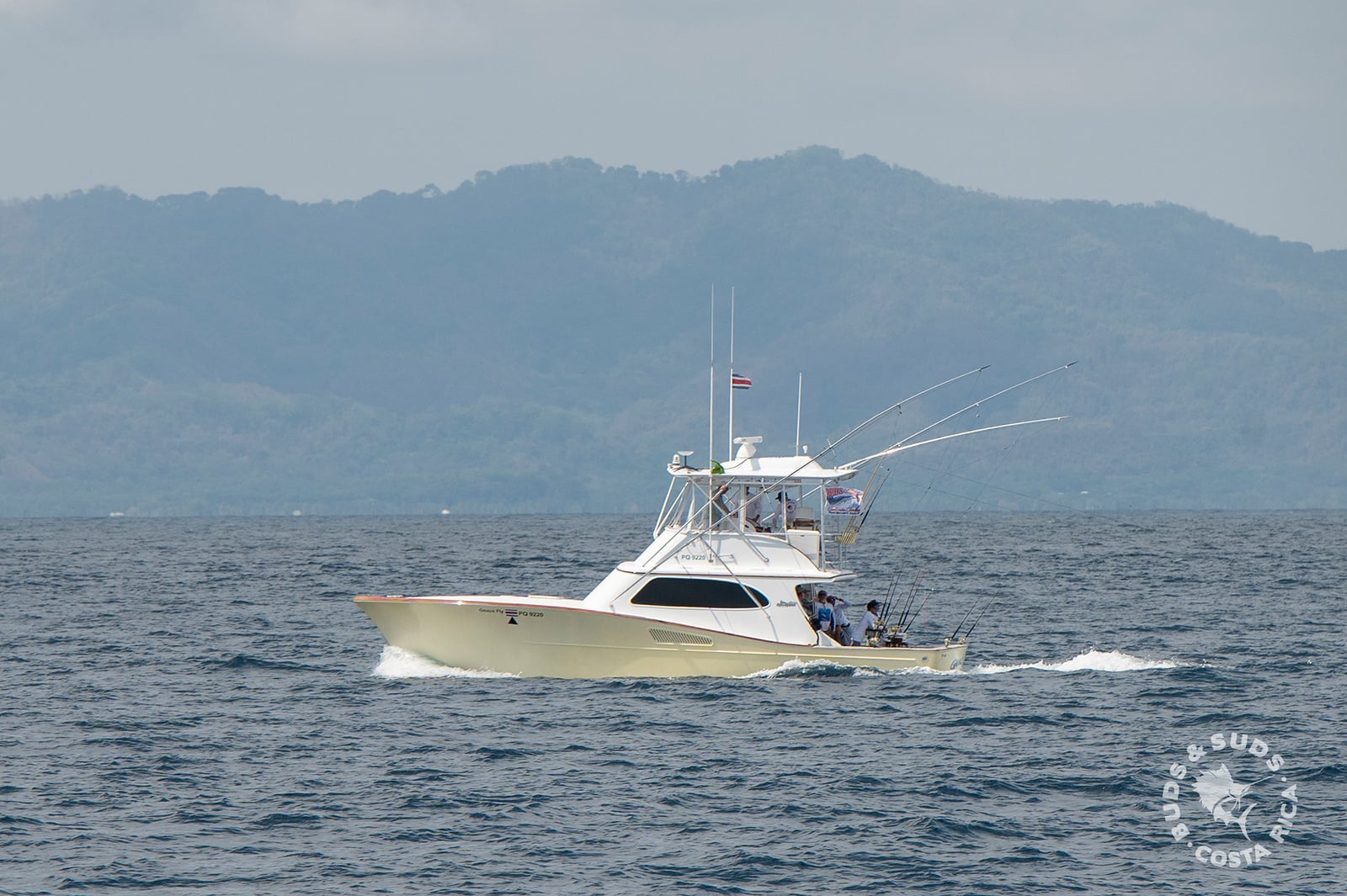 Geaux Fly, the yellow 43-foot Maverick sportfisher, from the side